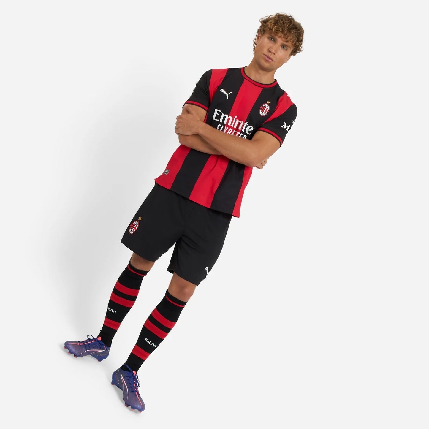 Full body view of model wearing AC Milan 2026/27 home kit
