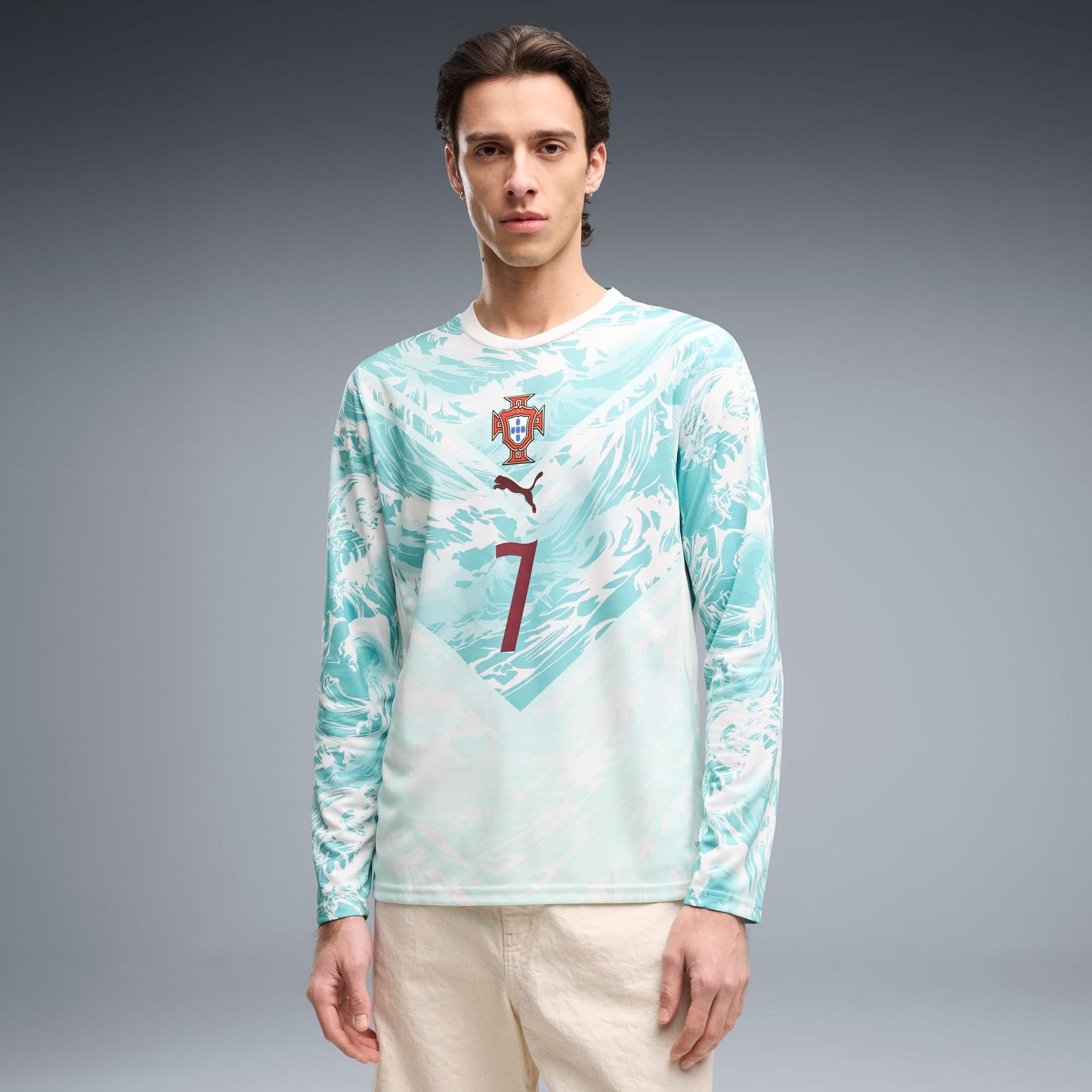 Man wearing a portugal 2026 long sleeve away stadium with ronaldo 7 printing