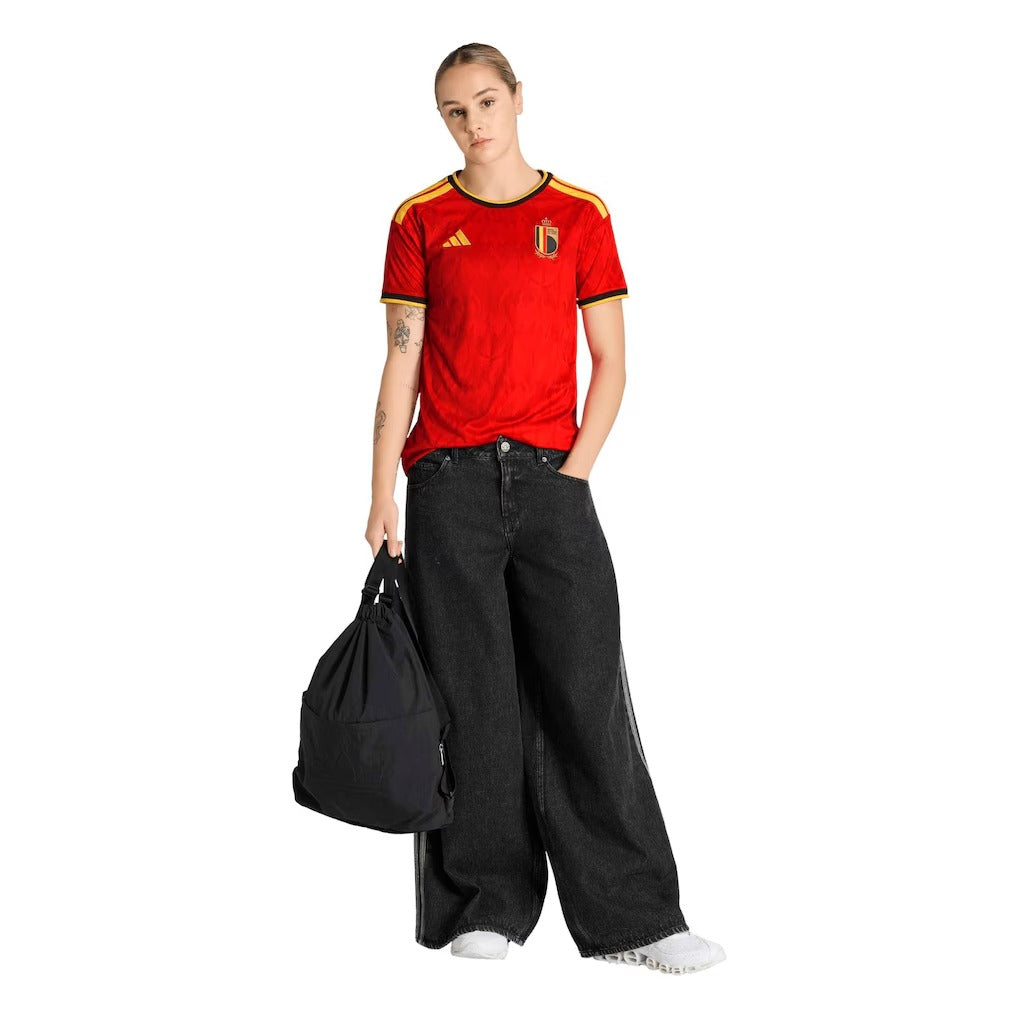 model wearing a belgium 2026 home red jersey