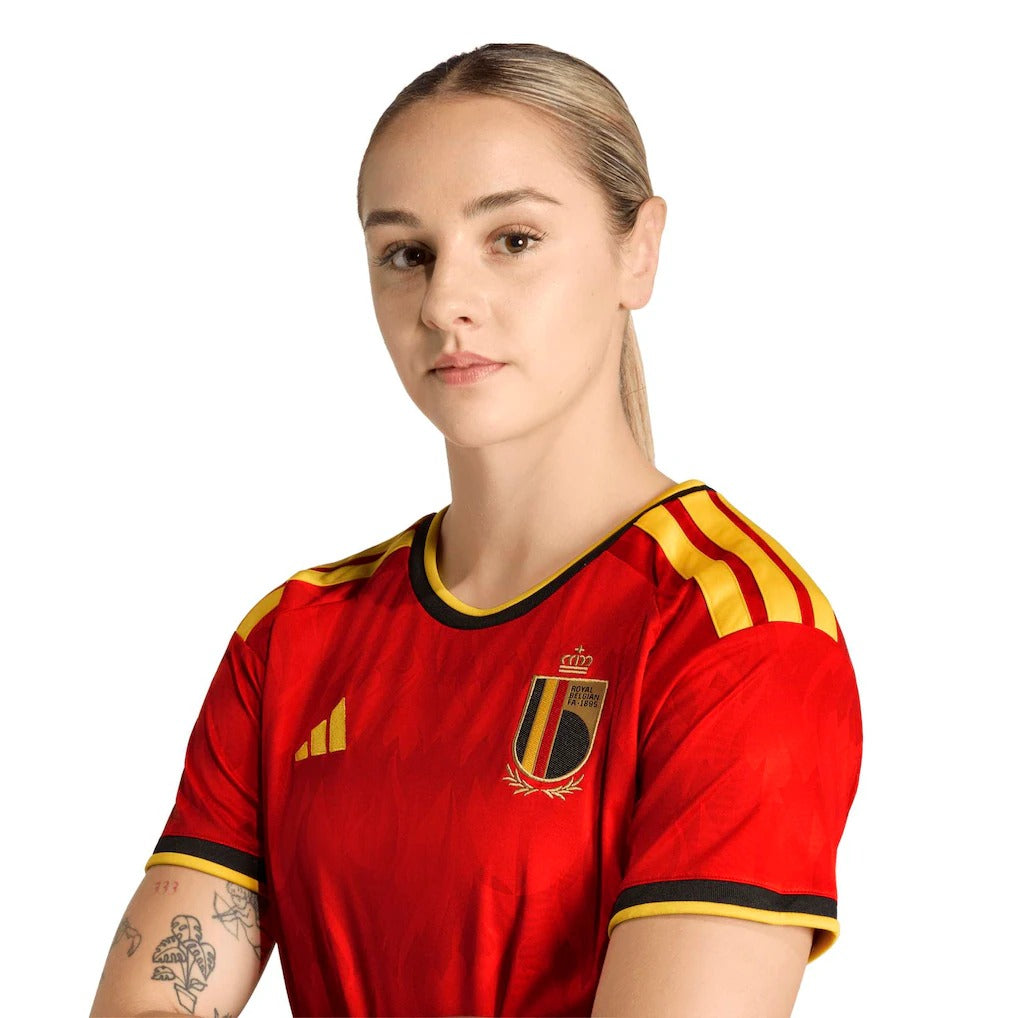model wearing a belgium 2026 home red jersey half details