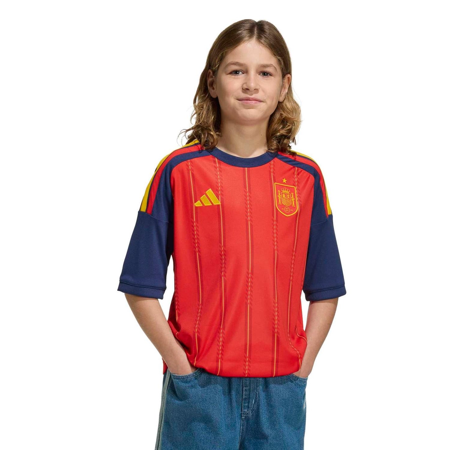 Boy Wearing a Spain 2026 World Cup Home Kids Stadium Replica Jersey