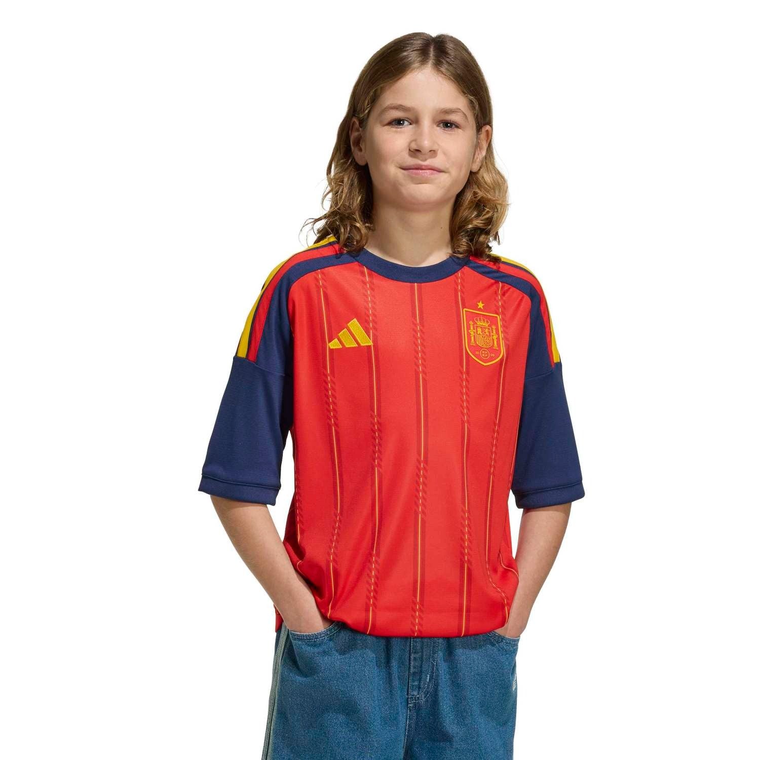 Boy Wearing a Spain 2026 World Cup Home Kids Stadium Replica Jersey