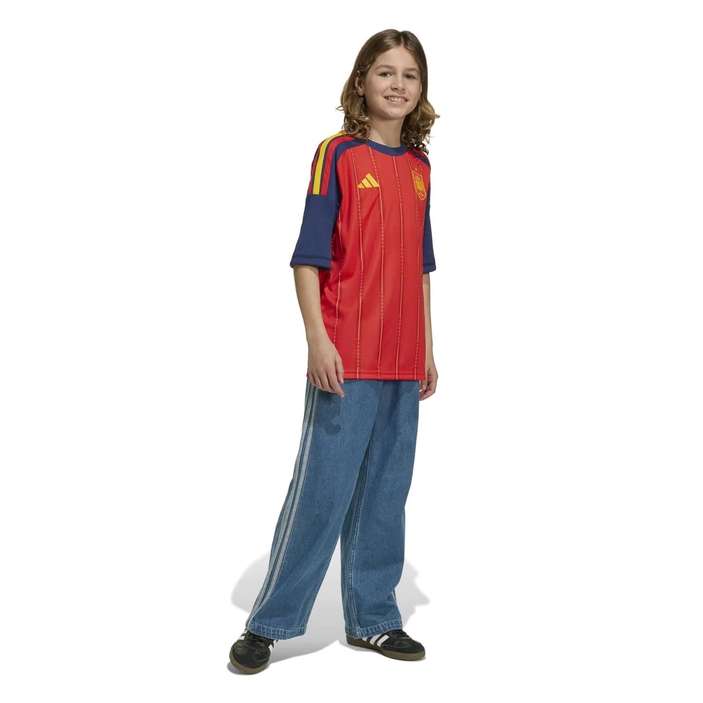 Boy Wearing a Spain 2026 World Cup Home Kids Stadium Replica Jersey front view