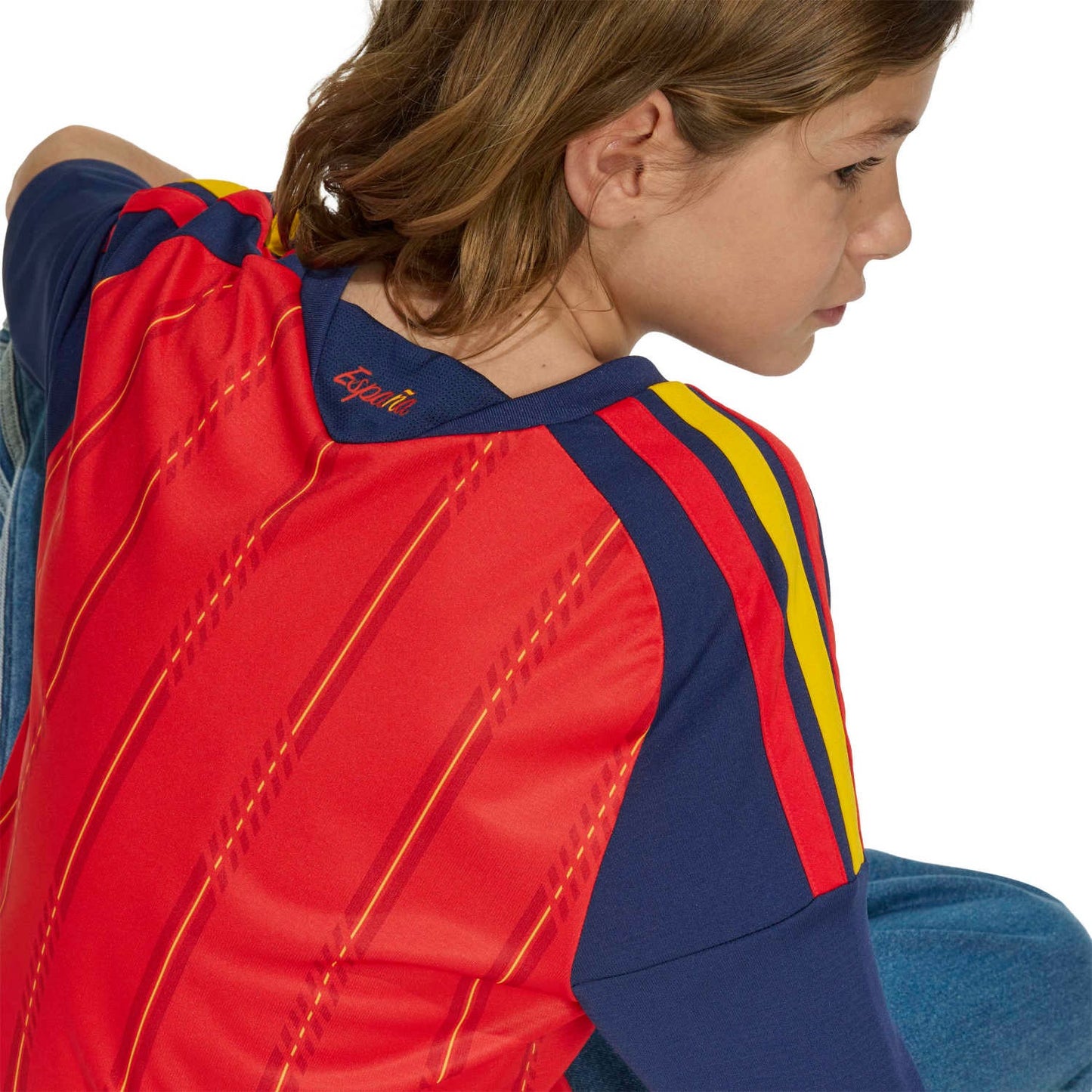 Boy Wearing a Spain 2026 World Cup Home Kids Stadium Replica Jersey back details