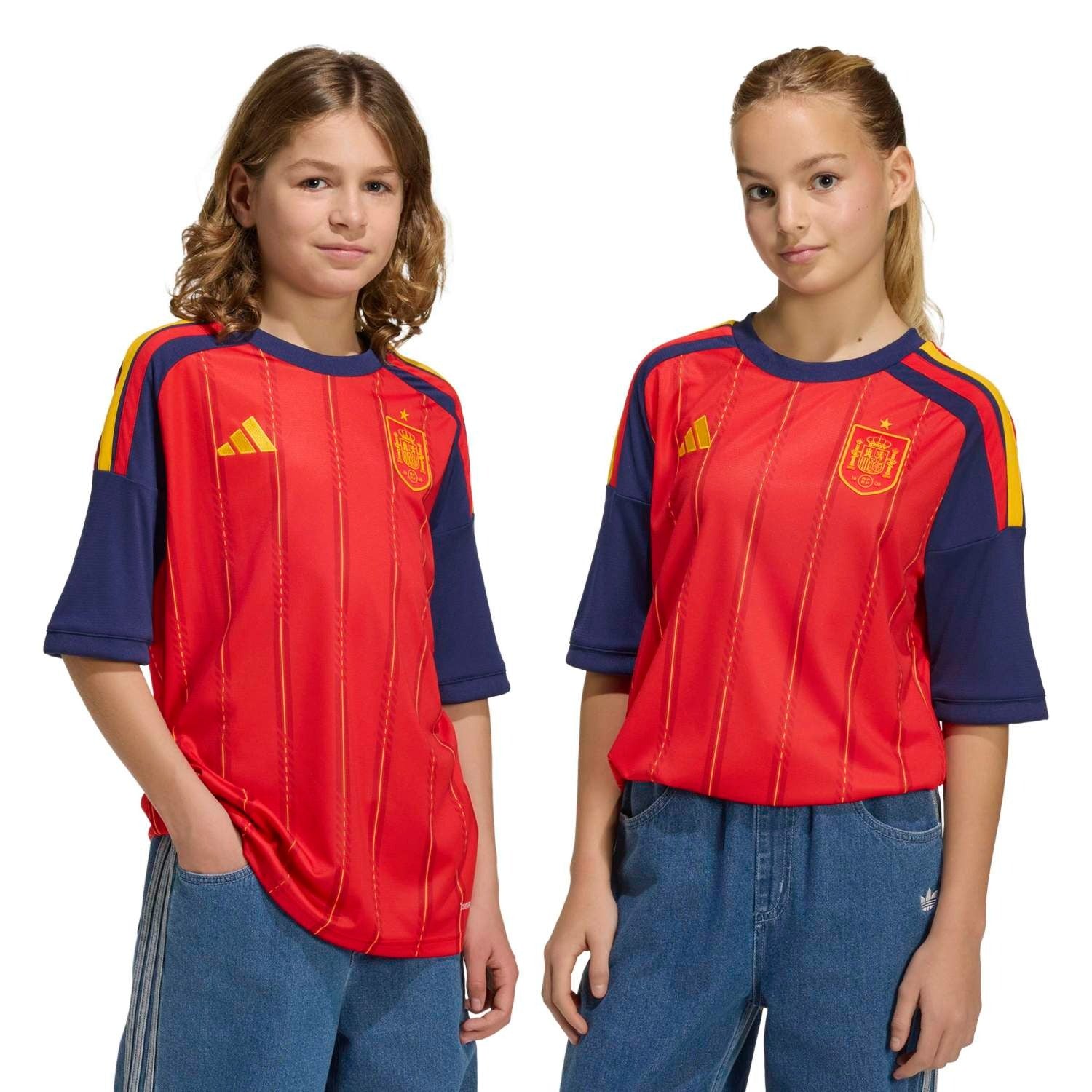 Girl wear a Spain 2026 World Cup Home Kids Stadium Replica Jersey