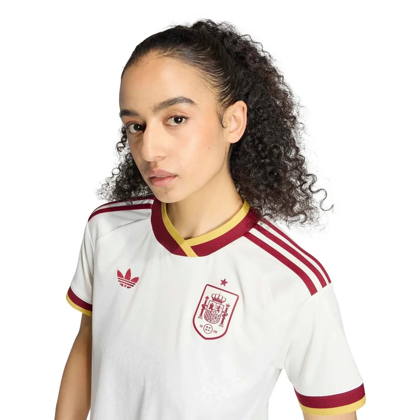 Women wearing a Spain 2026 World Cup Away Stadium Replica Jersey