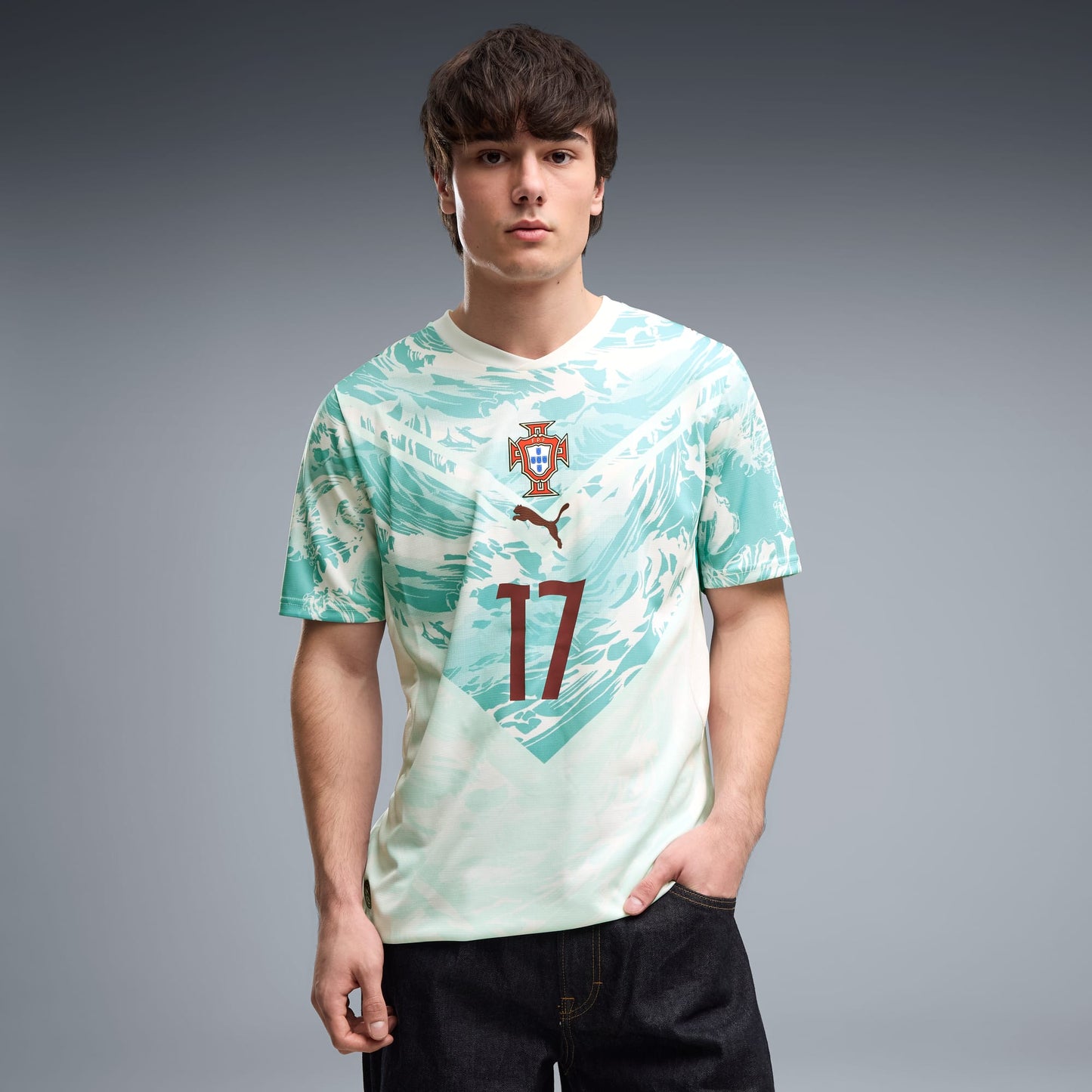 Person wearing a Portugal national team 2026 away stadium jersey with RAFA LEÃO #17 printing