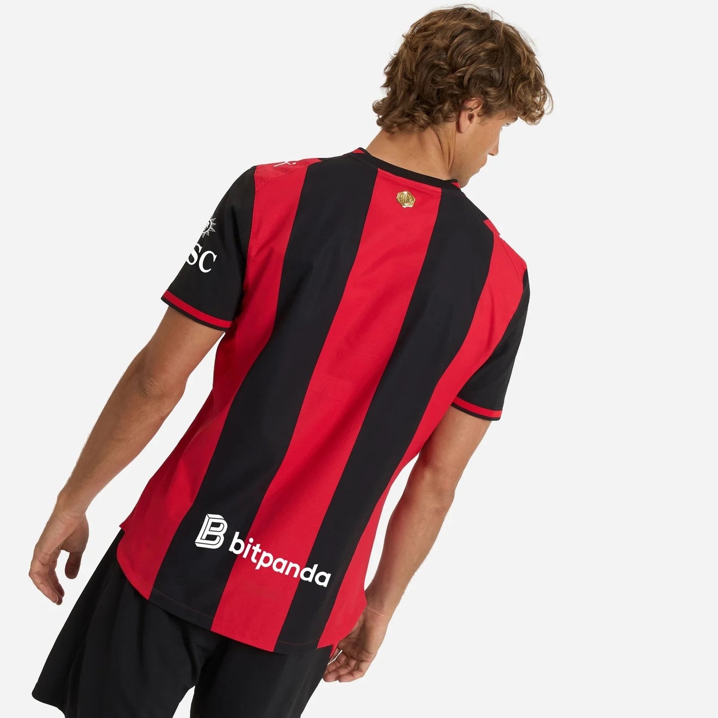 Model wearing AC Milan 2026/27 home soccer jersey
