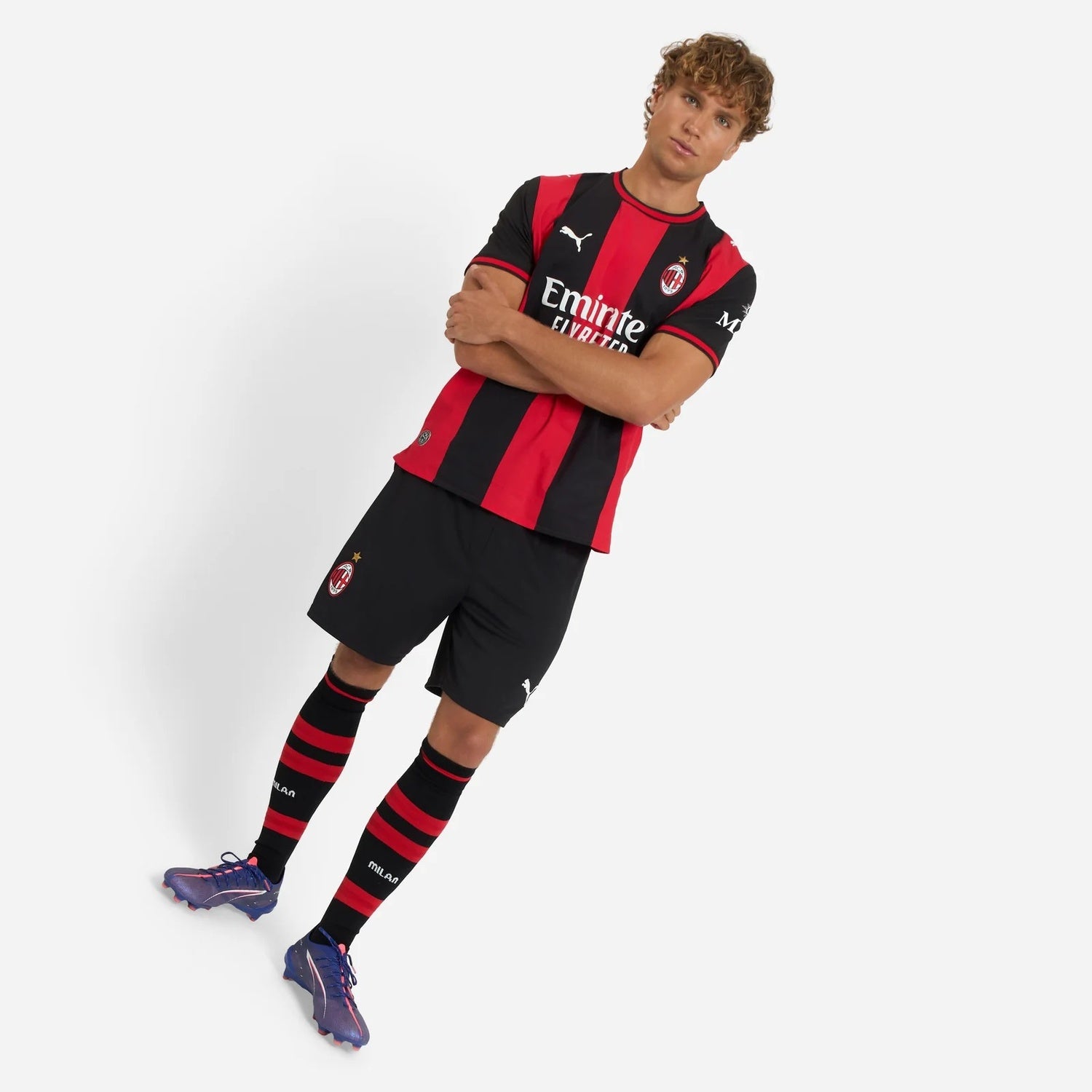 Full body view of model wearing AC Milan 2026/27 home kit