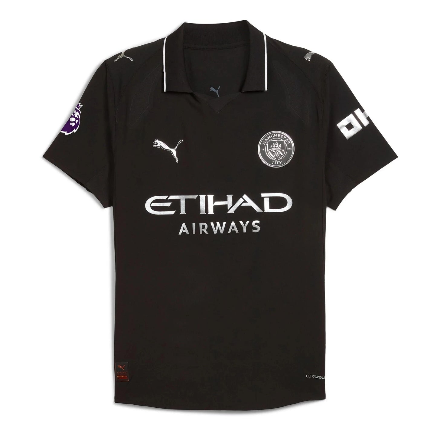 Flat lay of Manchester City 2025/26 away replica jersey front showing club crest and maroon sponsor details