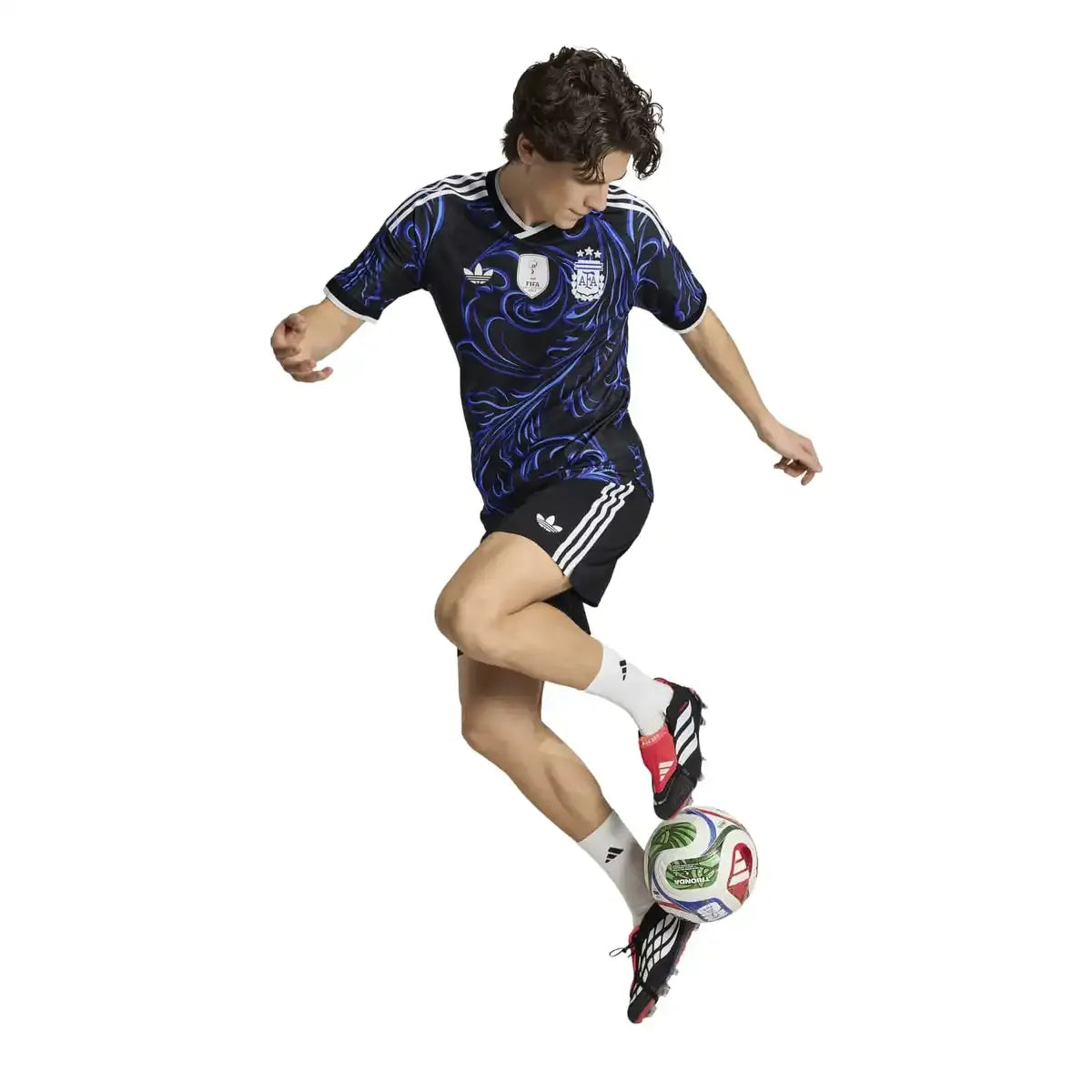 Person wearing a Argentina 2026 world cup national team away stadium replica jersey 