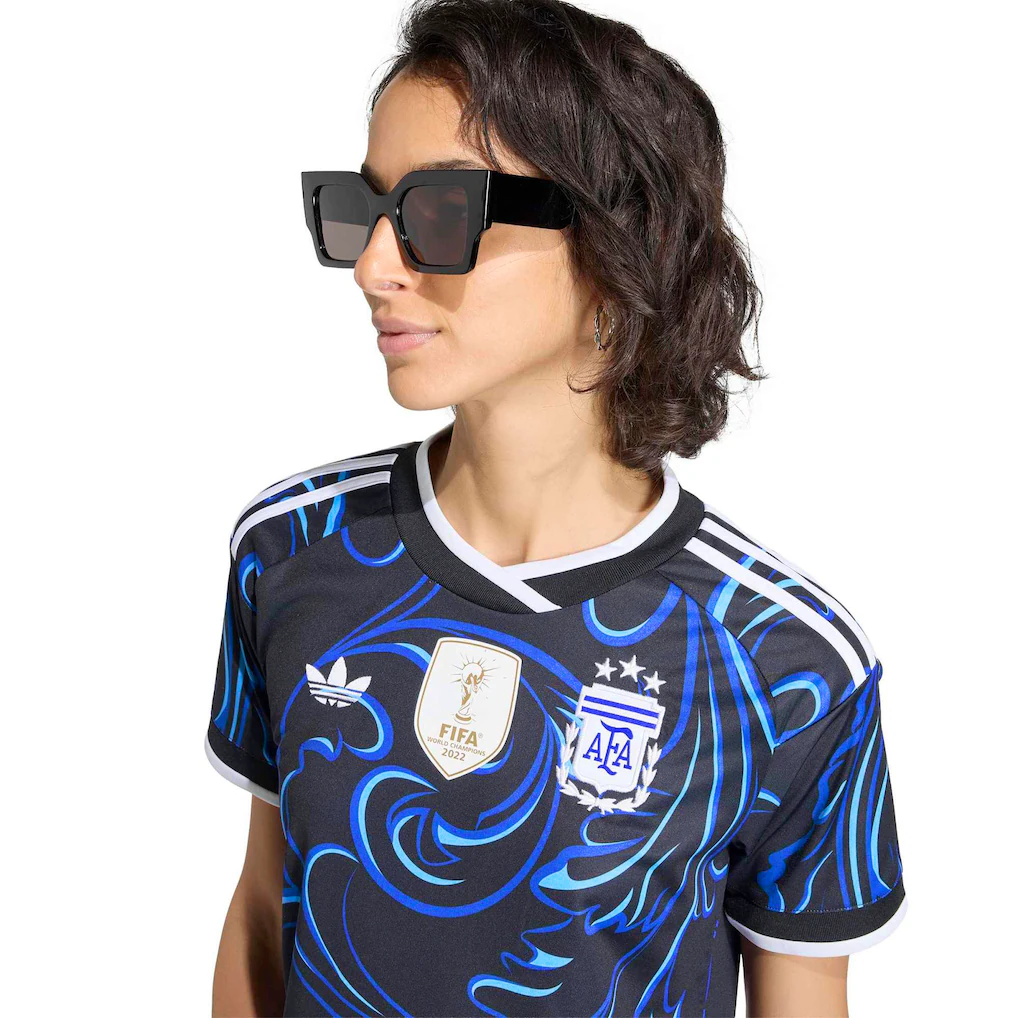 model wearing a Women's Argentina 2026 Away Stadium Replica Jersey