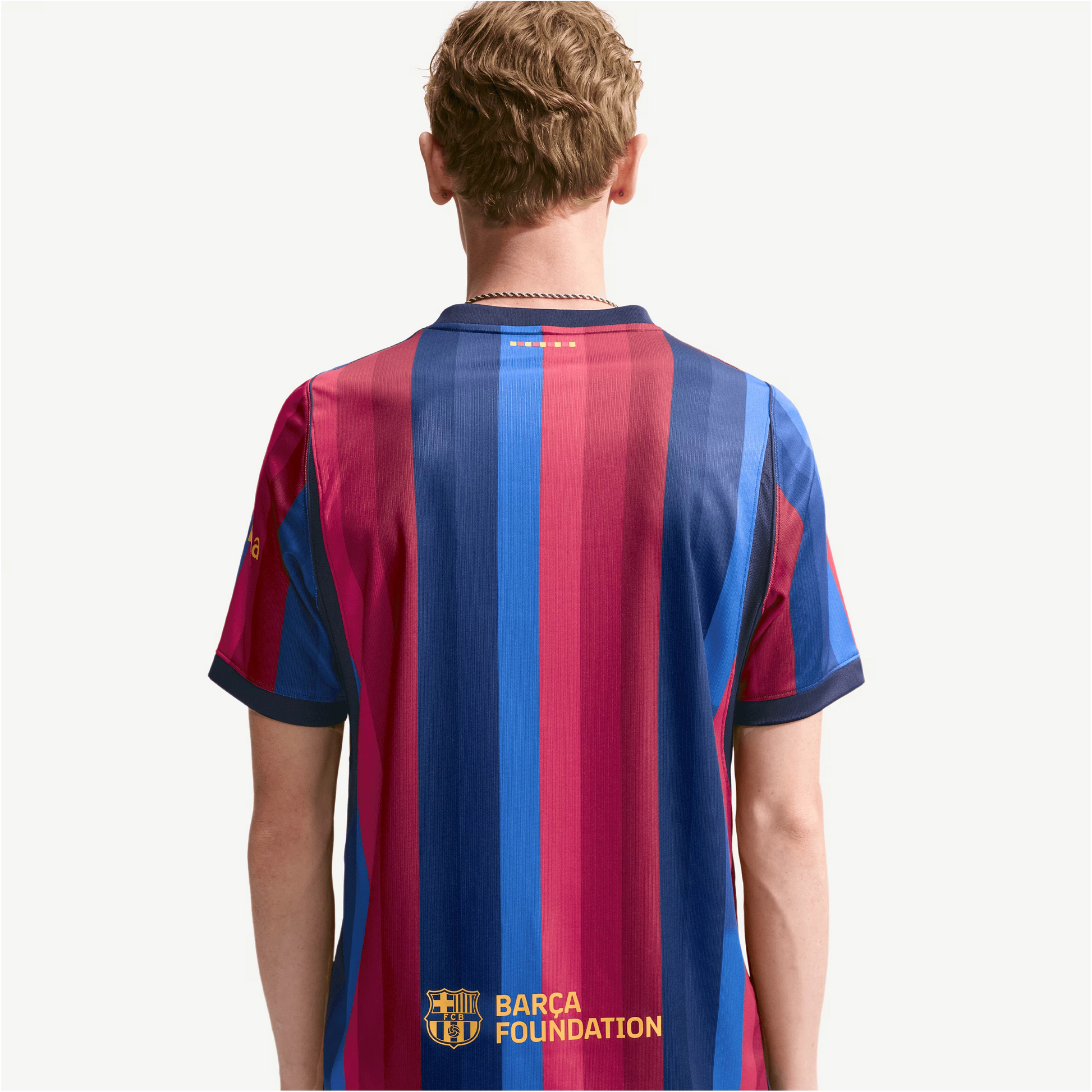 Man Wearing A Barcelona 2026/27 Home Stadium Replica Jersey Back