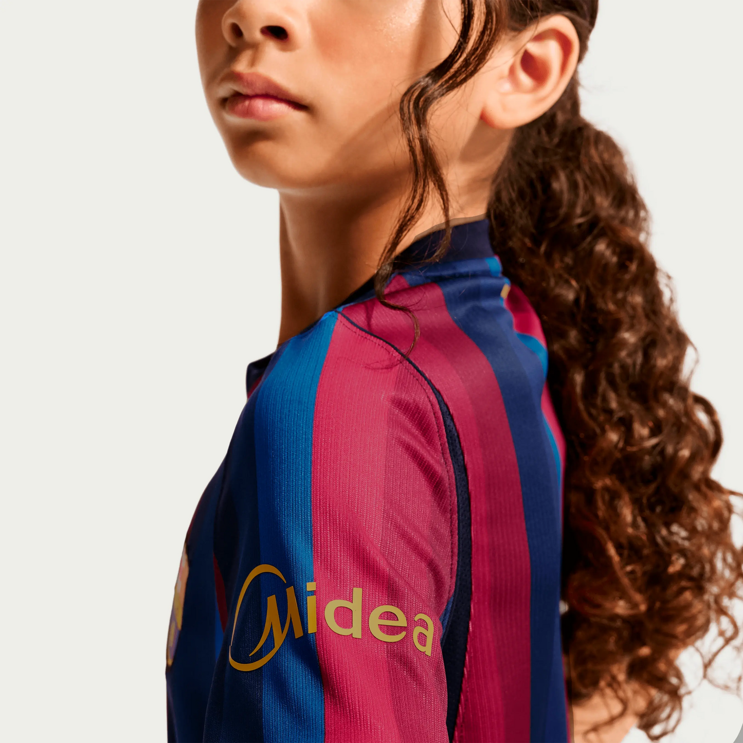 A Girl Wearing A 2627 Barcelona Home Jersey