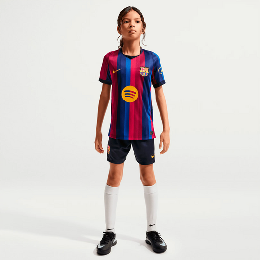 A Girl Wearing A 2627 Barcelona Home Jersey