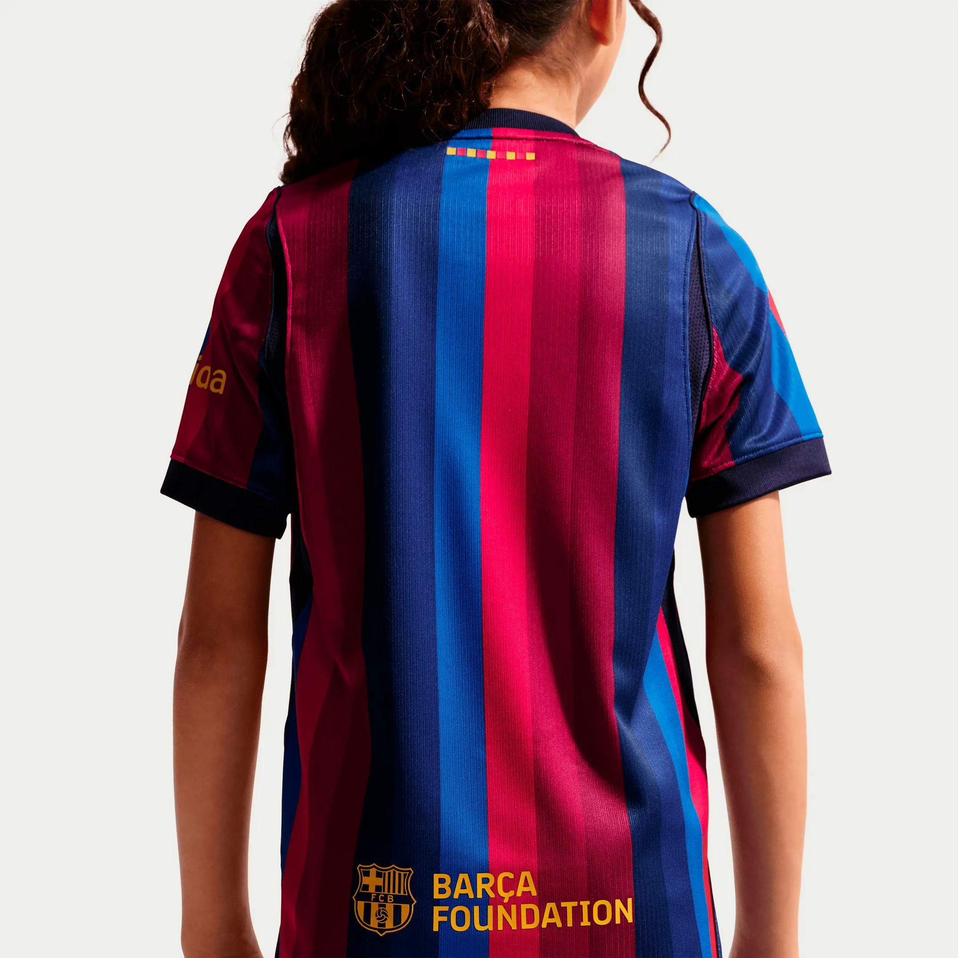 A Girl Wearing A 2627 Barcelona Home Jersey Back View