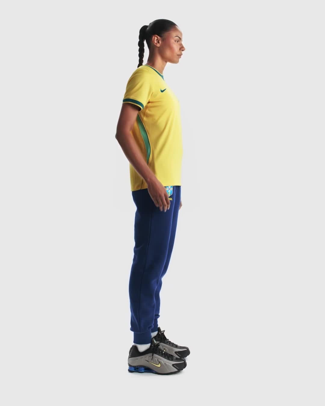 Women Wearing A Yellow Brazil 2026 Home Jersey Side View