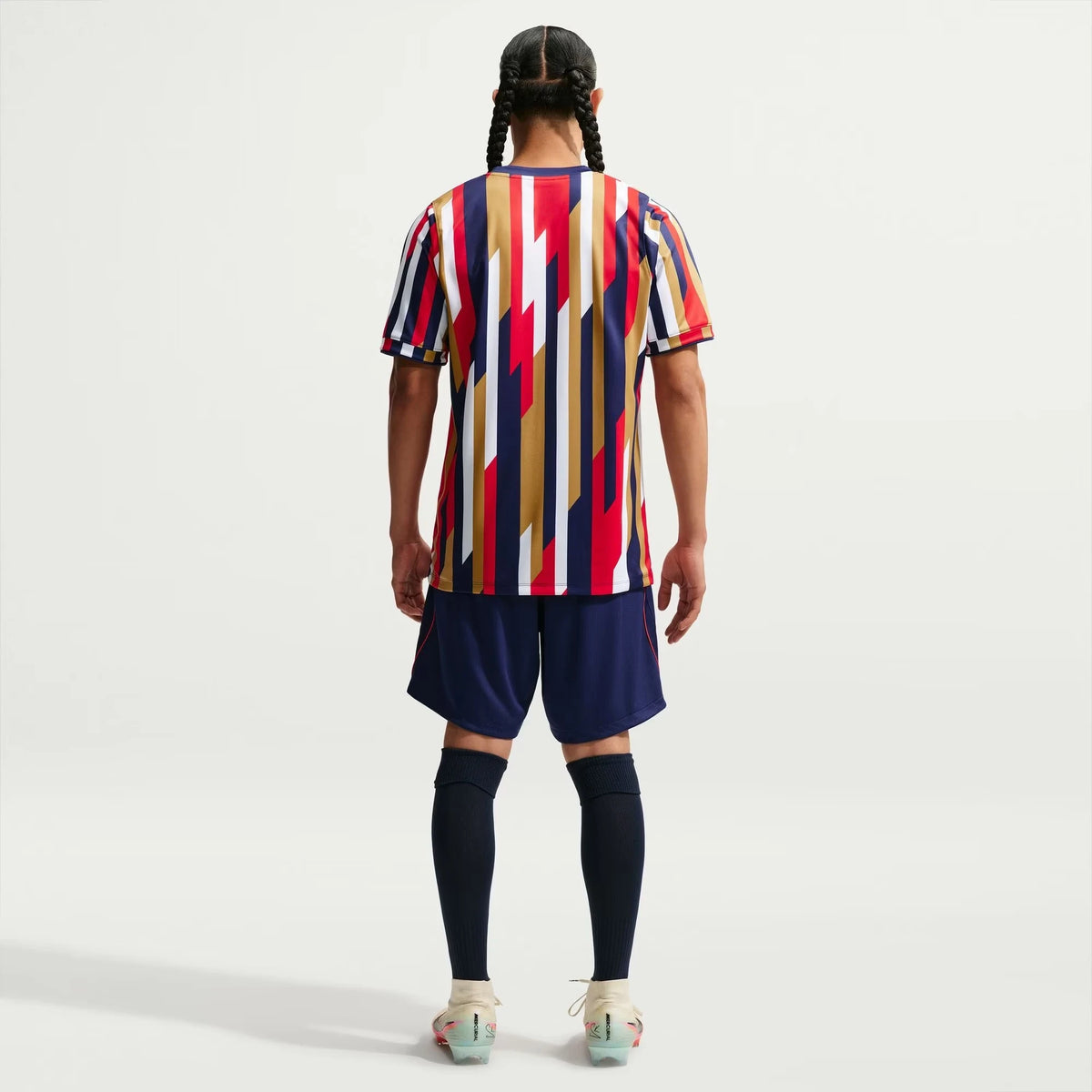 A model shown from the back wearing a Chivas 2026-2027 home white Dri-FIT pre-match top