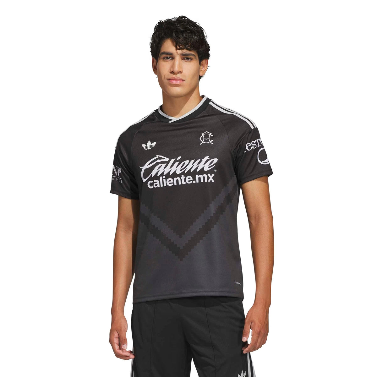 A man modeling a Club America 2026-2027 away black replica football shirt