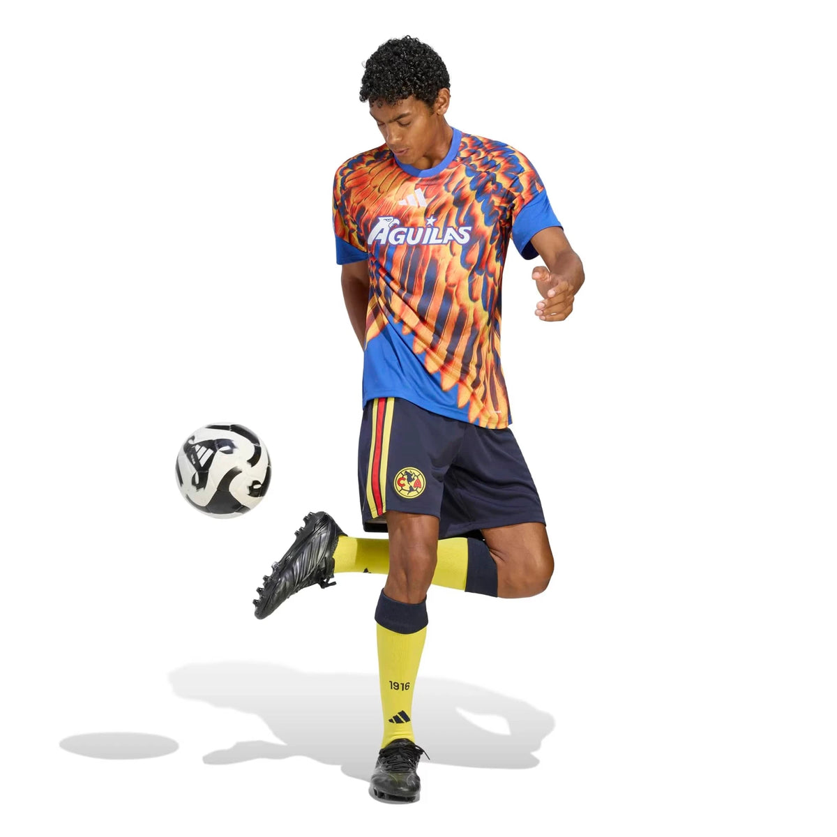 A soccer player wearing a Club America 2026-2027 home blue pre-match top