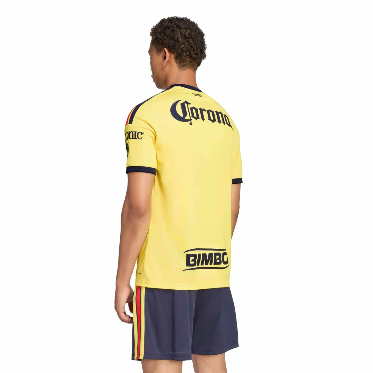 A man shown from the back wearing a   Club America 2026-2027 home yellow replica football shirt 