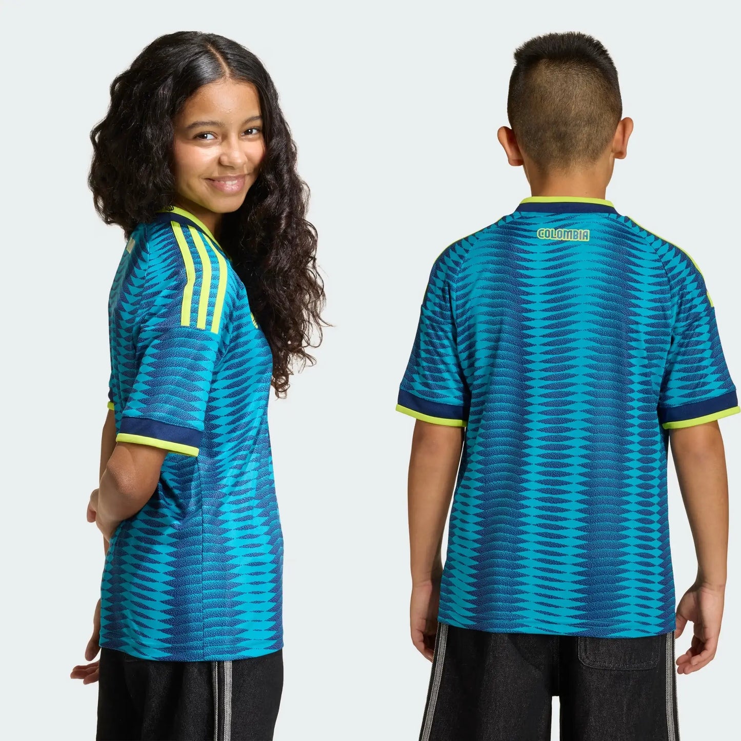 A Girl and A Boy Wearing Blue Colombia 2026 Away Jersey