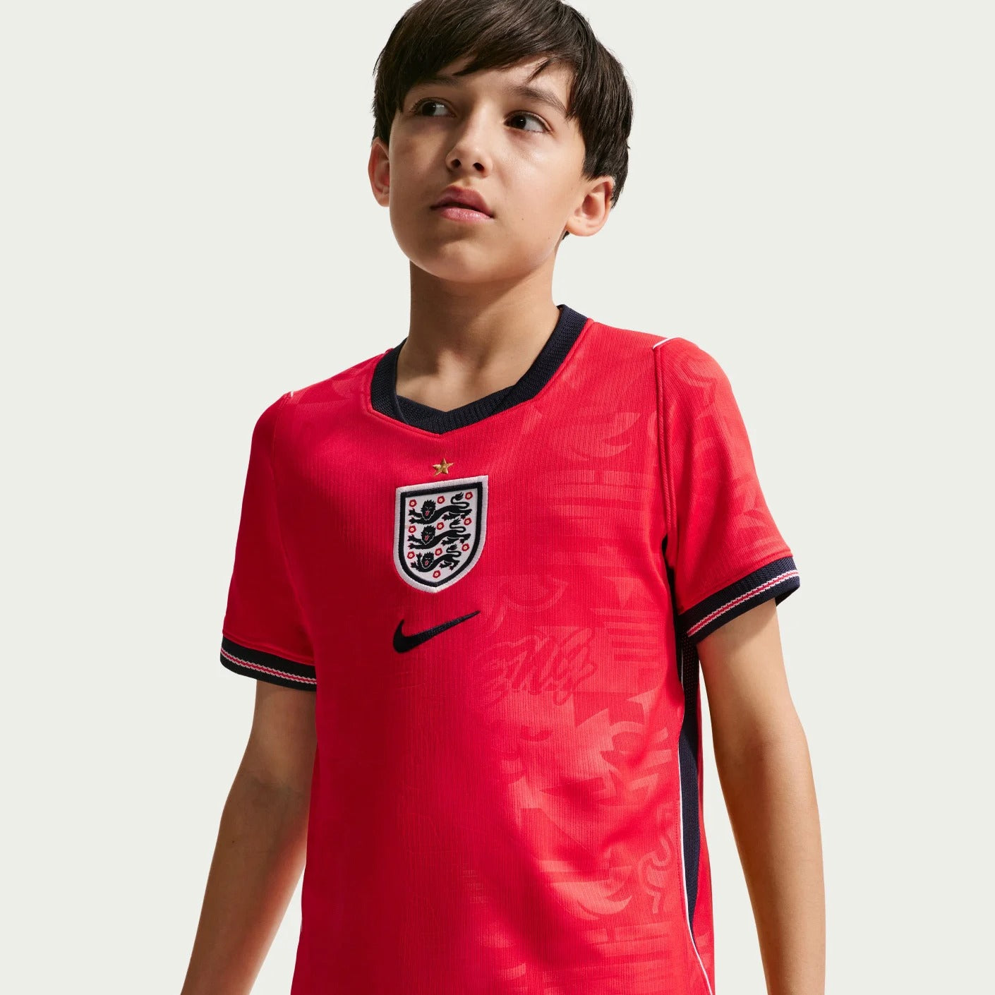 Boy wearing an England 2026 World Cup National Team Stadium Away Kids Jersey