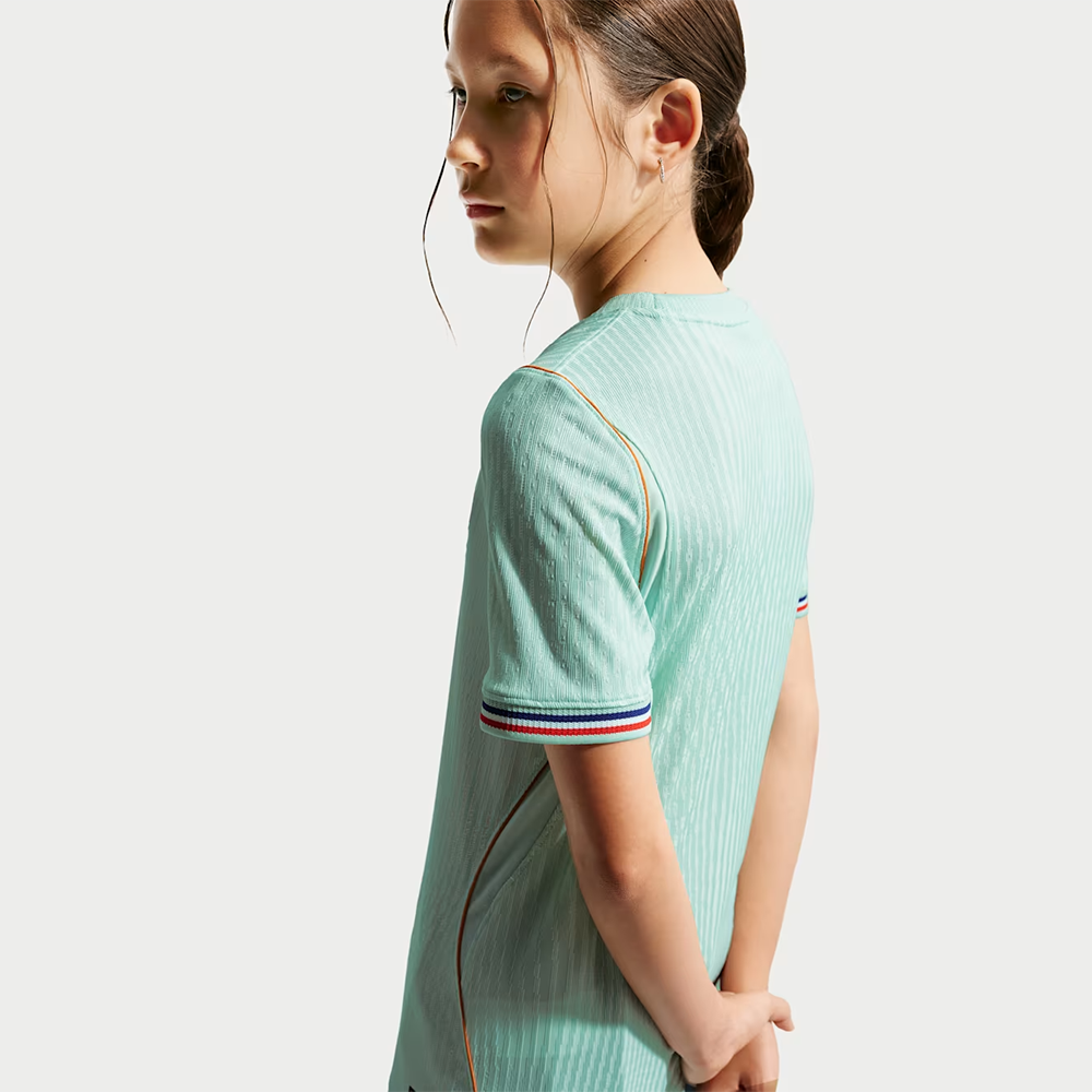 gilr wearing France 2026 World Cup Away Kids Stadium Replica Kit