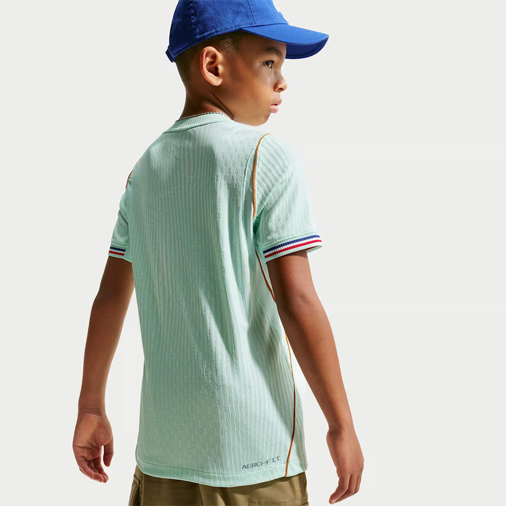back view of boy wearing France 2026 World Cup Away Kids Stadium Replica Kit