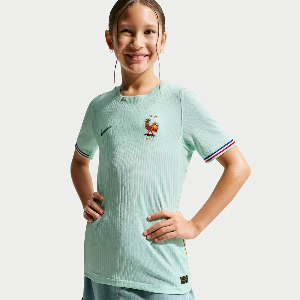 girl wearing France 2026 World Cup Away Kids Stadium Replica Kit