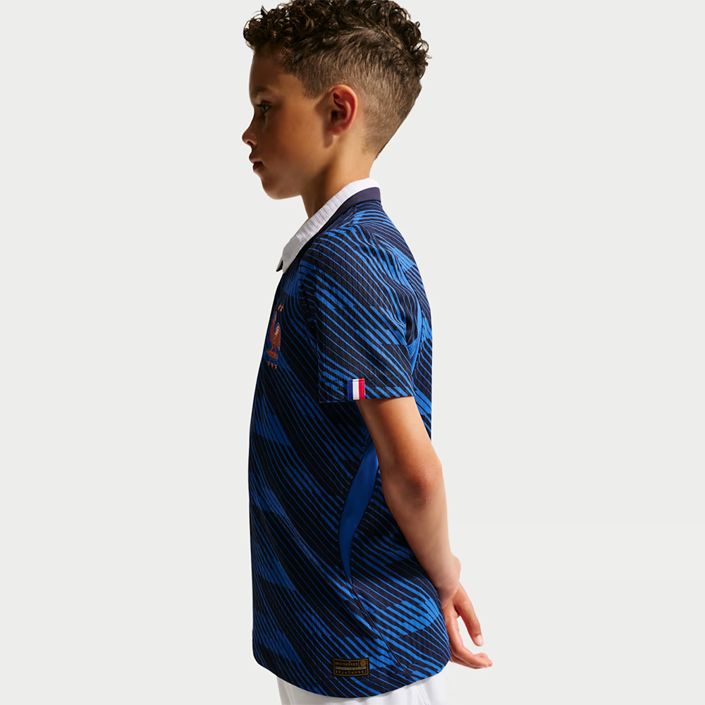 boy wearing France 2026 World Cup Home Kids Stadium Replica Kit