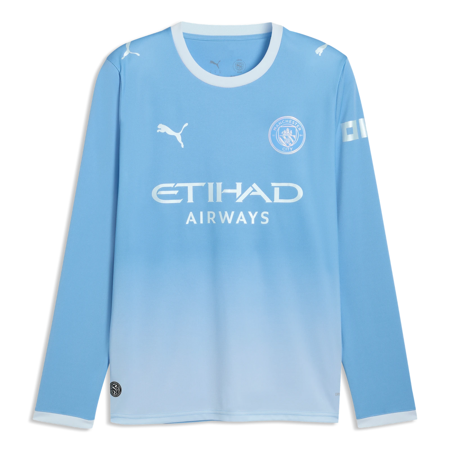 Flat lay of Manchester City 2026/27 home stadium replica long sleeve jersey front with Haaland 9 and metallic monochrome crest