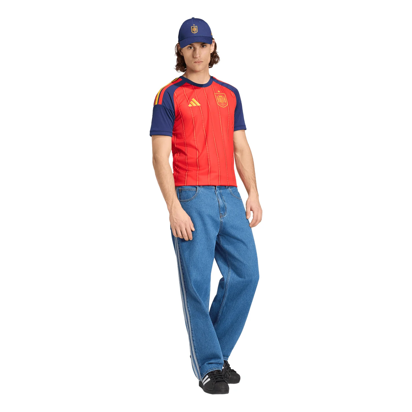 Model wearing Spain 2026 home red soccer jersey