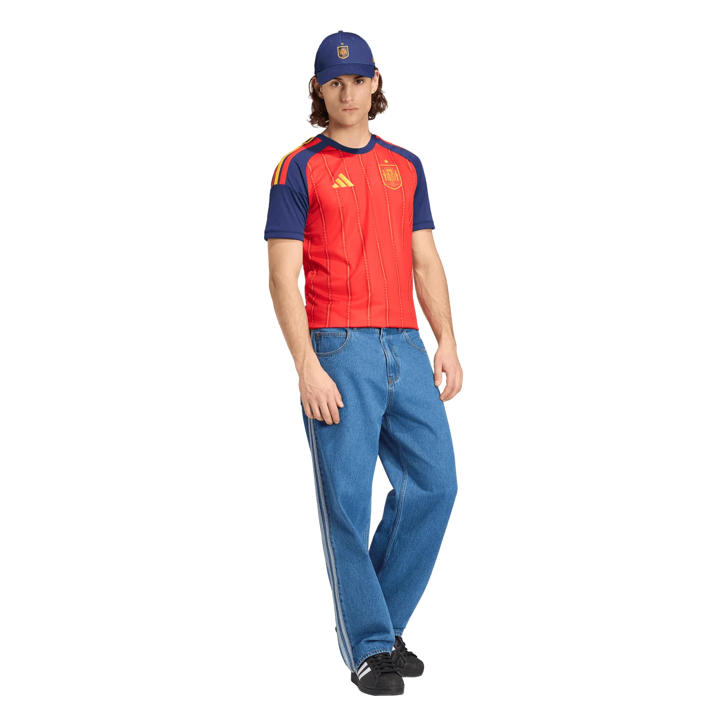 Model wearing Spain 2026 home red soccer jersey
