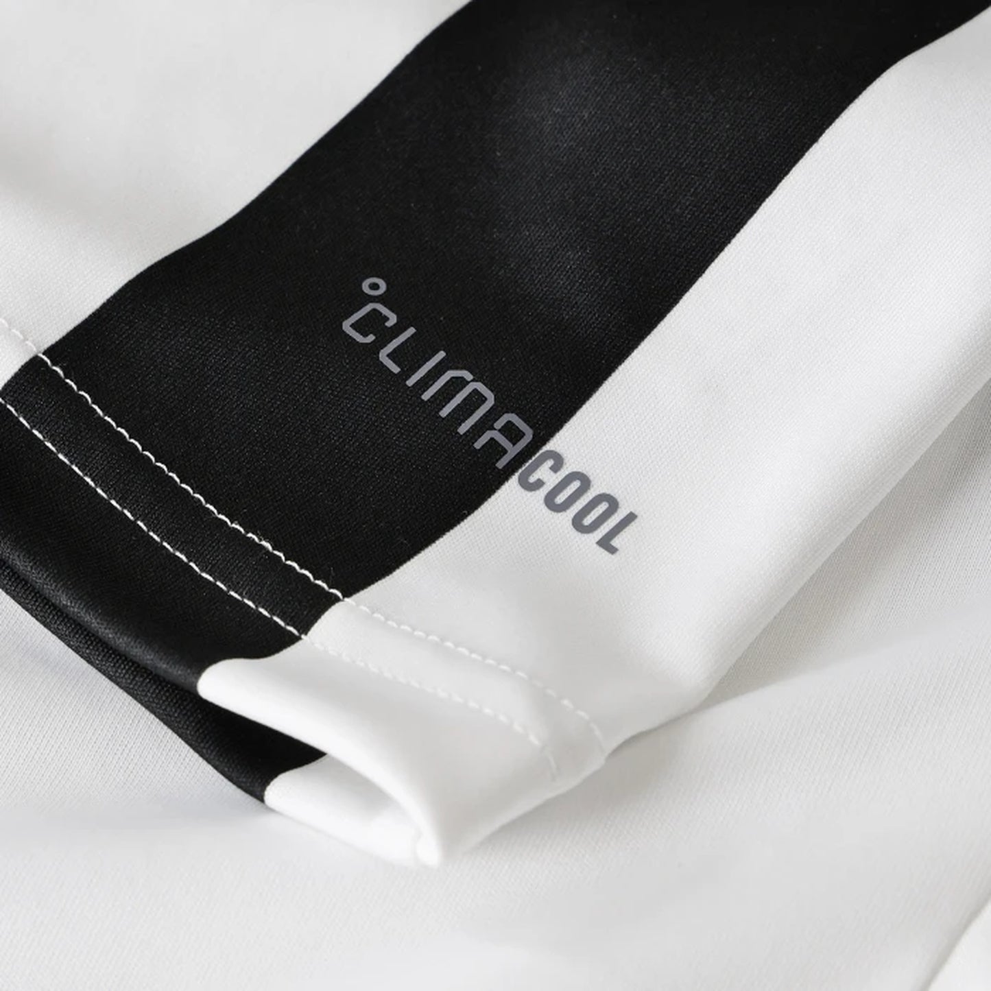Detail of breathable Climacool fabric on Juventus women's home kit
