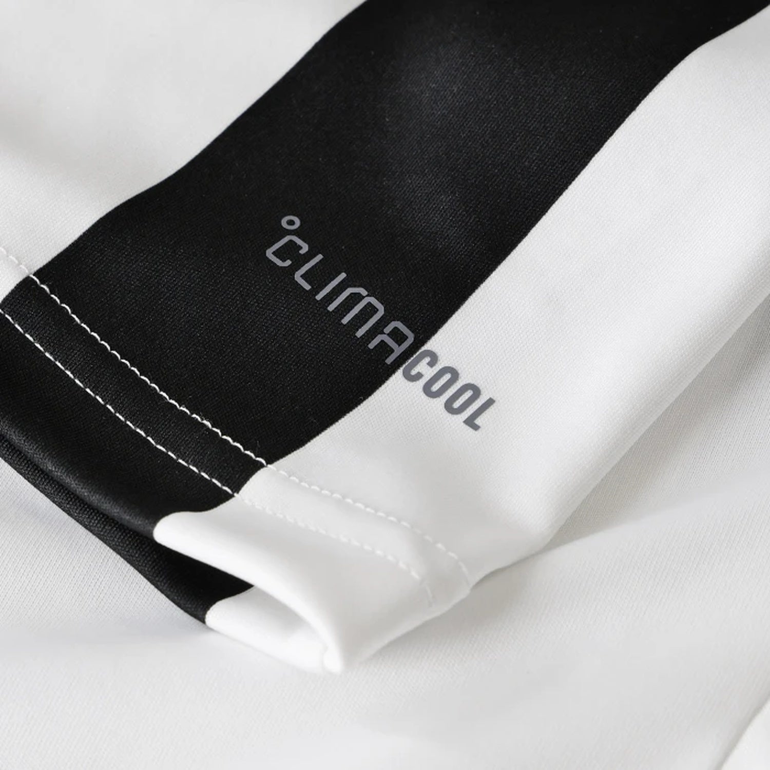 Detail of breathable Climacool fabric on Juventus women's home kit