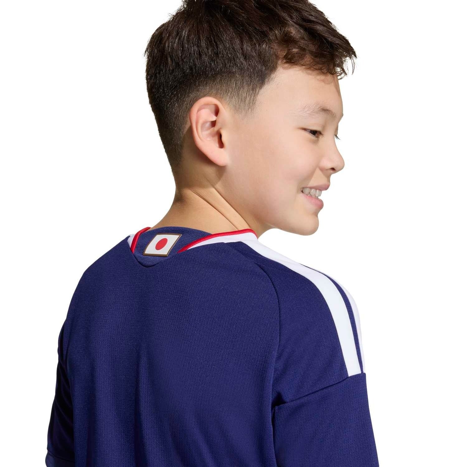 back view of Boy wearing Kids Japan 2026 World Cup Home stadium replica jersey