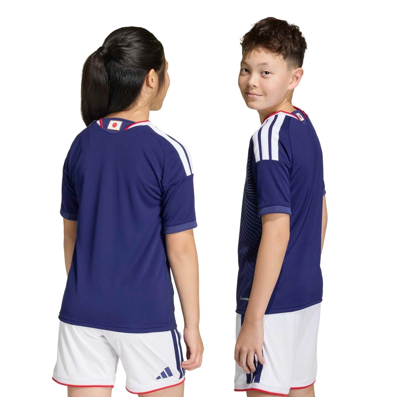 Boy And Girl wearing Kids Japan 2026 World Cup Home stadium replica jersey back view