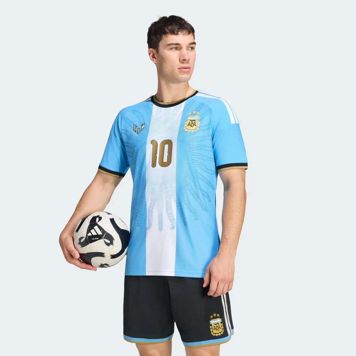 Man Wearing A  Argentina national team AFA x Messi light blue match authentic football shirt with Lionel Messi name and number 10 printing