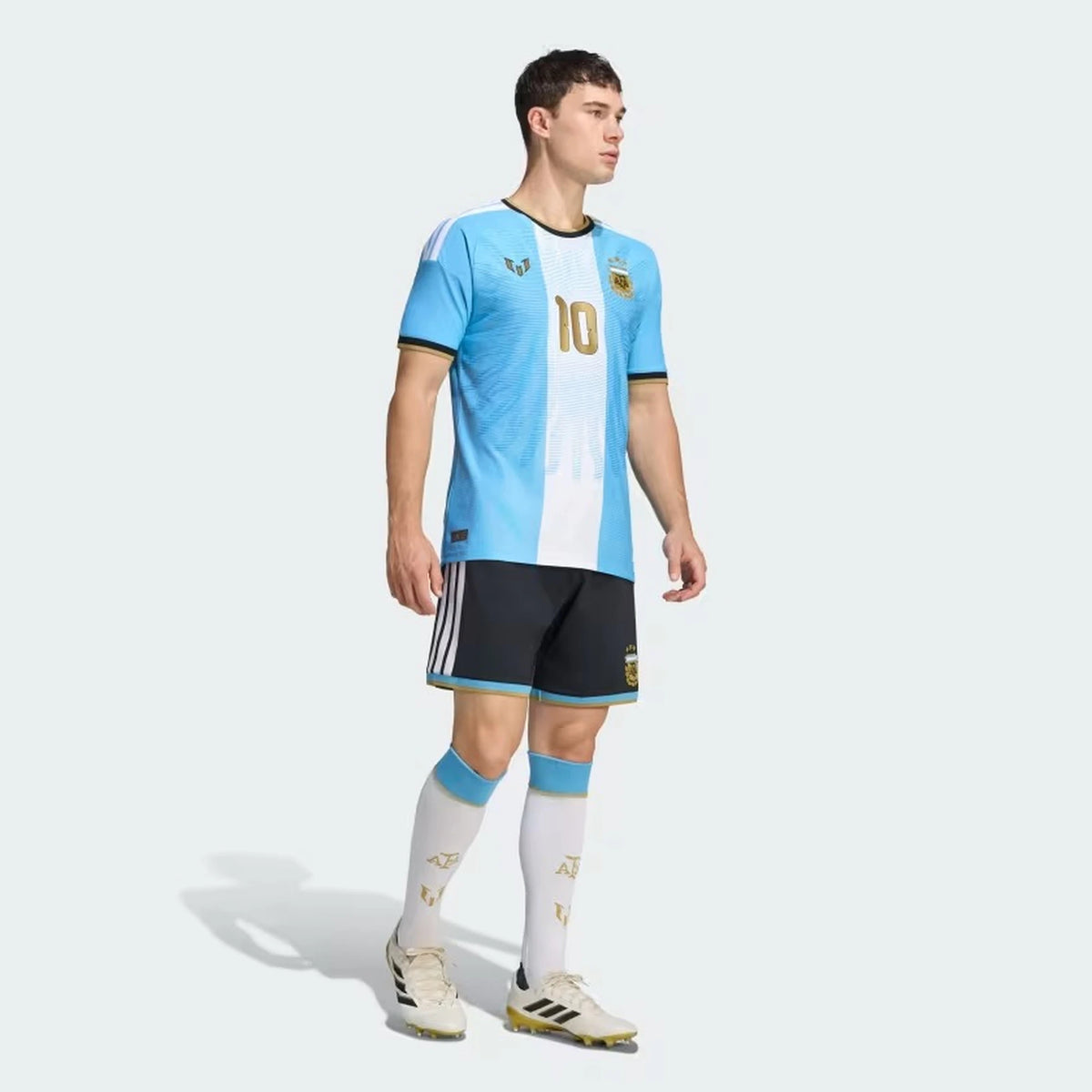 Man Wearing A  Argentina national team AFA x Messi light blue match authentic football shirt with Lionel Messi name and number 10 printing