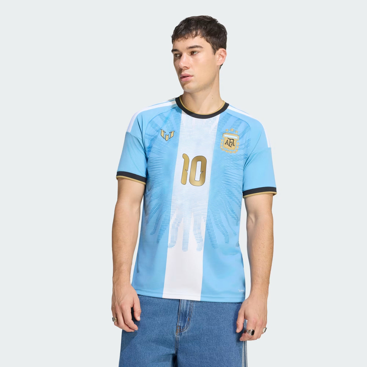 Men Wearing A Back view of Argentina national team AFA x Messi light blue replica football shirt with Lionel Messi name and number 10 printing 