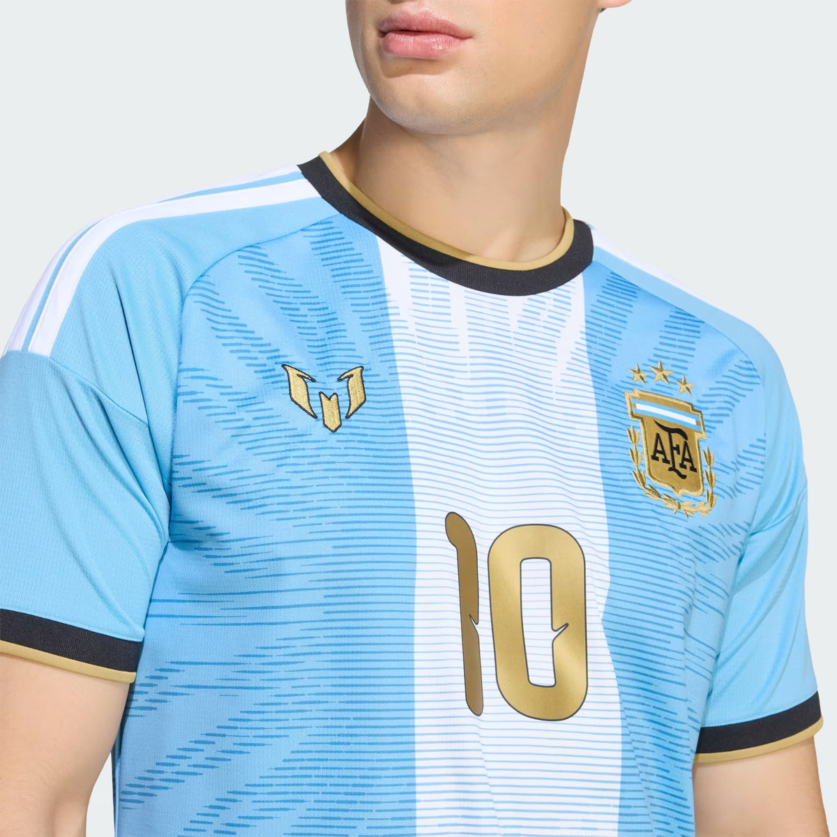  Man Wearing a Argentina national team AFA x Messi light blue replica football shirt with Lionel Messi name and number 10 printing