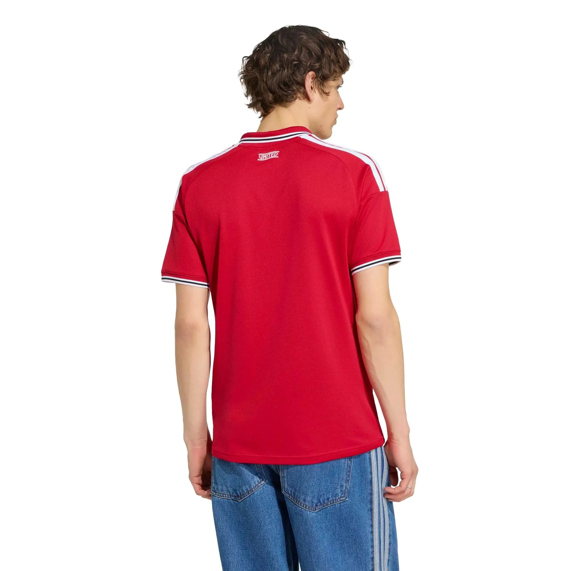 Person wearing a red sports jersey with white stripes on a white background