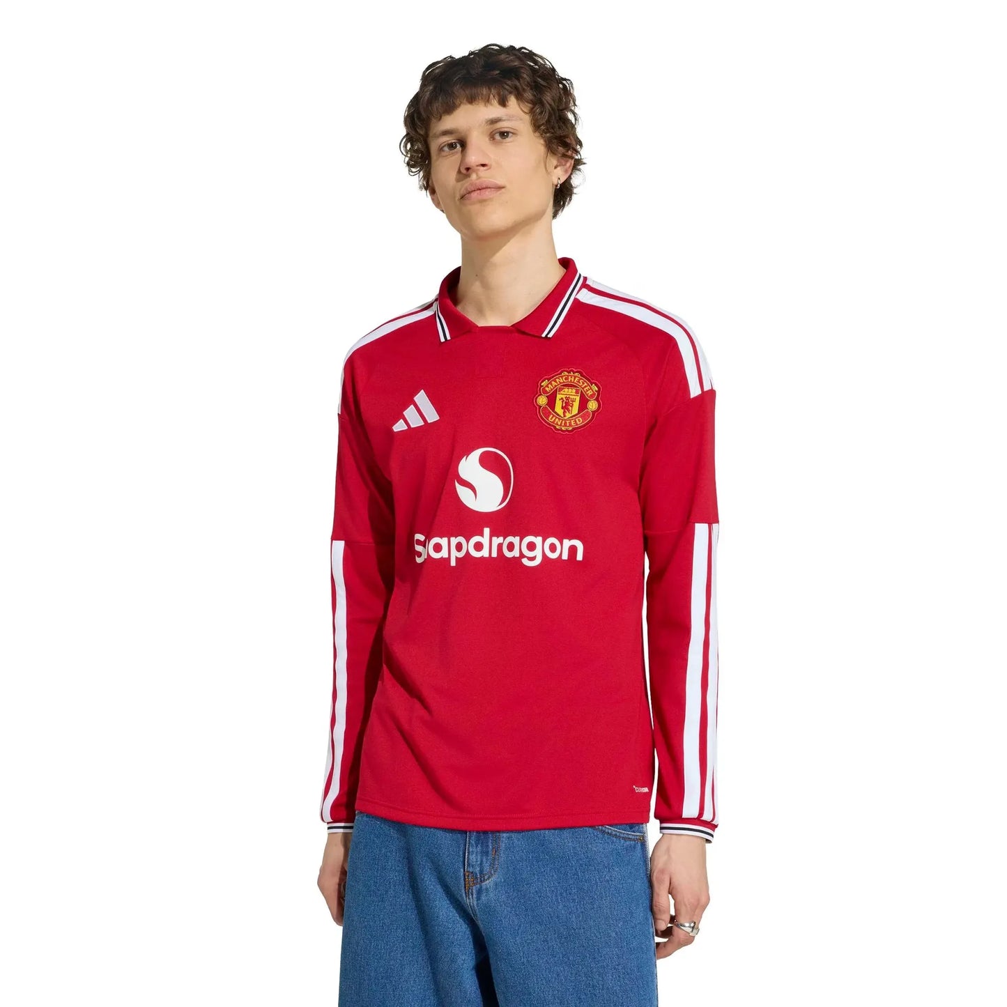 Person wearing a Manchester United 2026/27 Home Stadium Long Sleeve Jersey