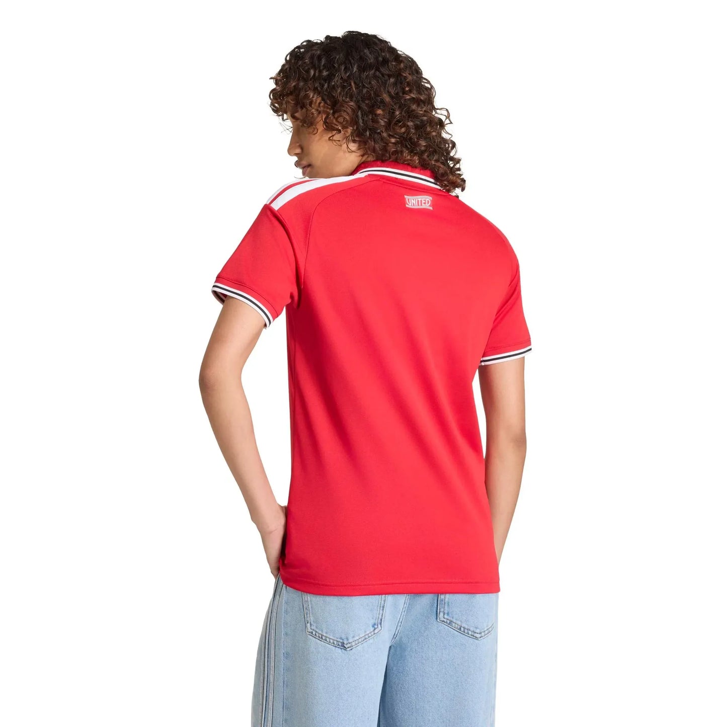 Person wearing a Manchester United Women's 2026/27 Home Stadium Replica Jersey