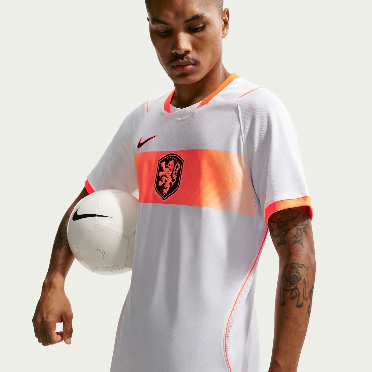 Men Wearing A Netherlands 2026 World Cup Away Stadium Replica Jersey 