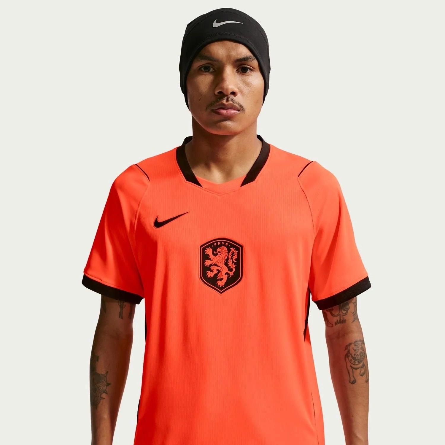 men wearing a Netherlands 2026 World Cup Home Stadium Replica Jersey