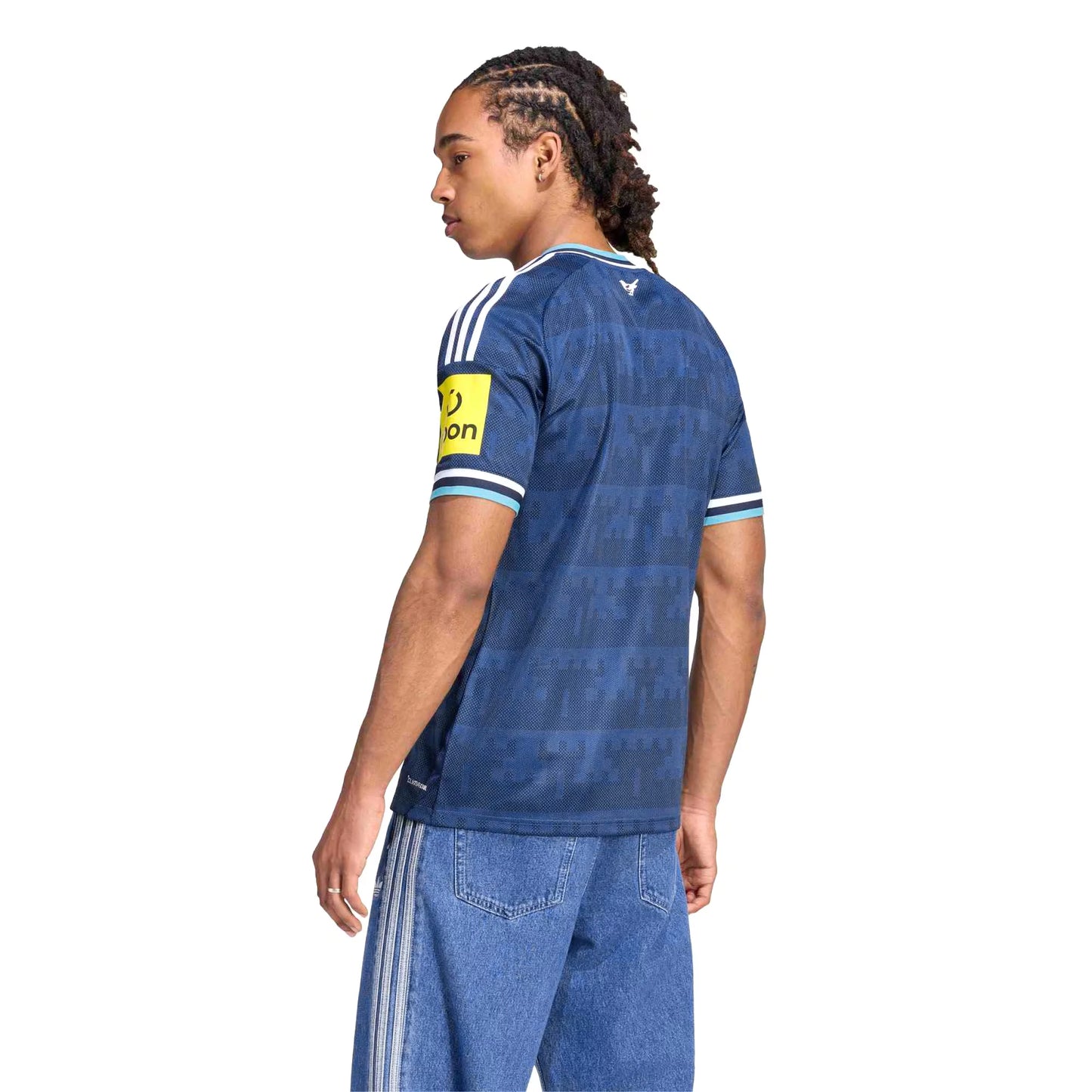 Side View Of A Man Wear A Newcastle United 2026 27 Home Jersey