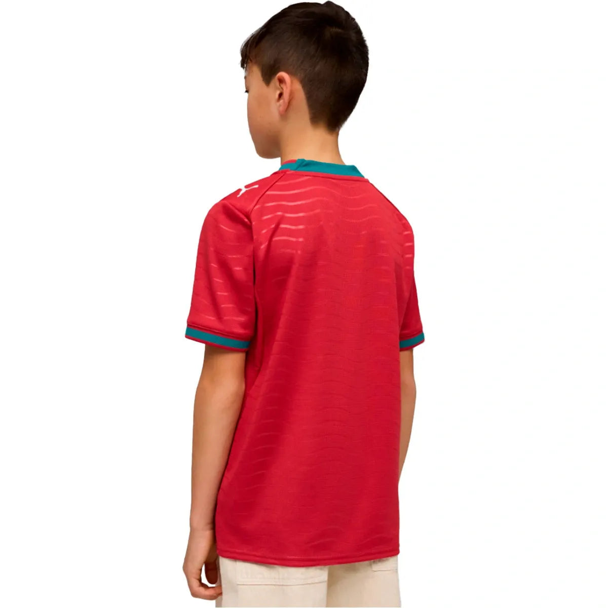 boy wearing a red portugal jersey
