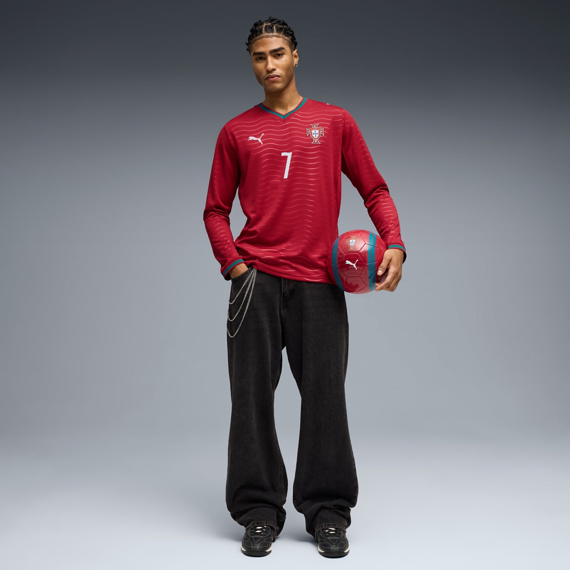 Person wearing a portugal 2026 long sleeve home stadium with ronaldo 7 printing